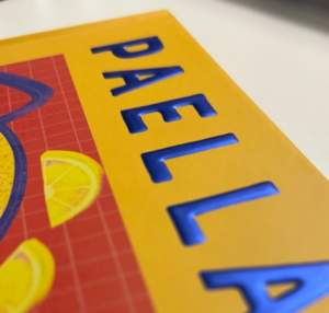 Embossed hard cover book