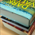 Perfect bound books - hardacse (top) and softback (2 below)
