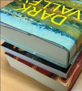 Perfect bound books - hardacse (top) and softback (2 below)